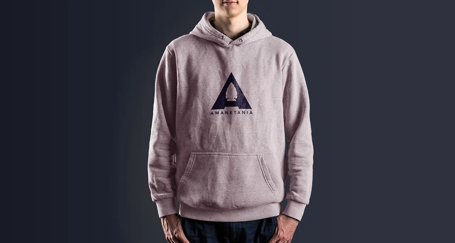 A heather hoodie worn with the Amanetania mark printed across the chest