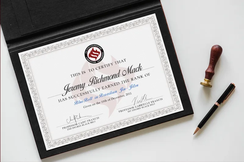 A printed rank certificate carrying the mark, with a wax seal and pen alongside