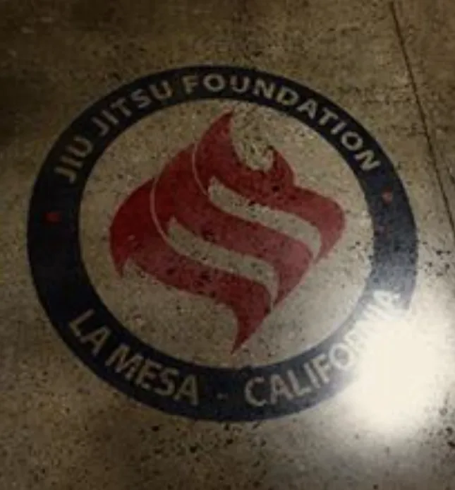 The mark set into the academy floor, ringed with the words La Mesa, California