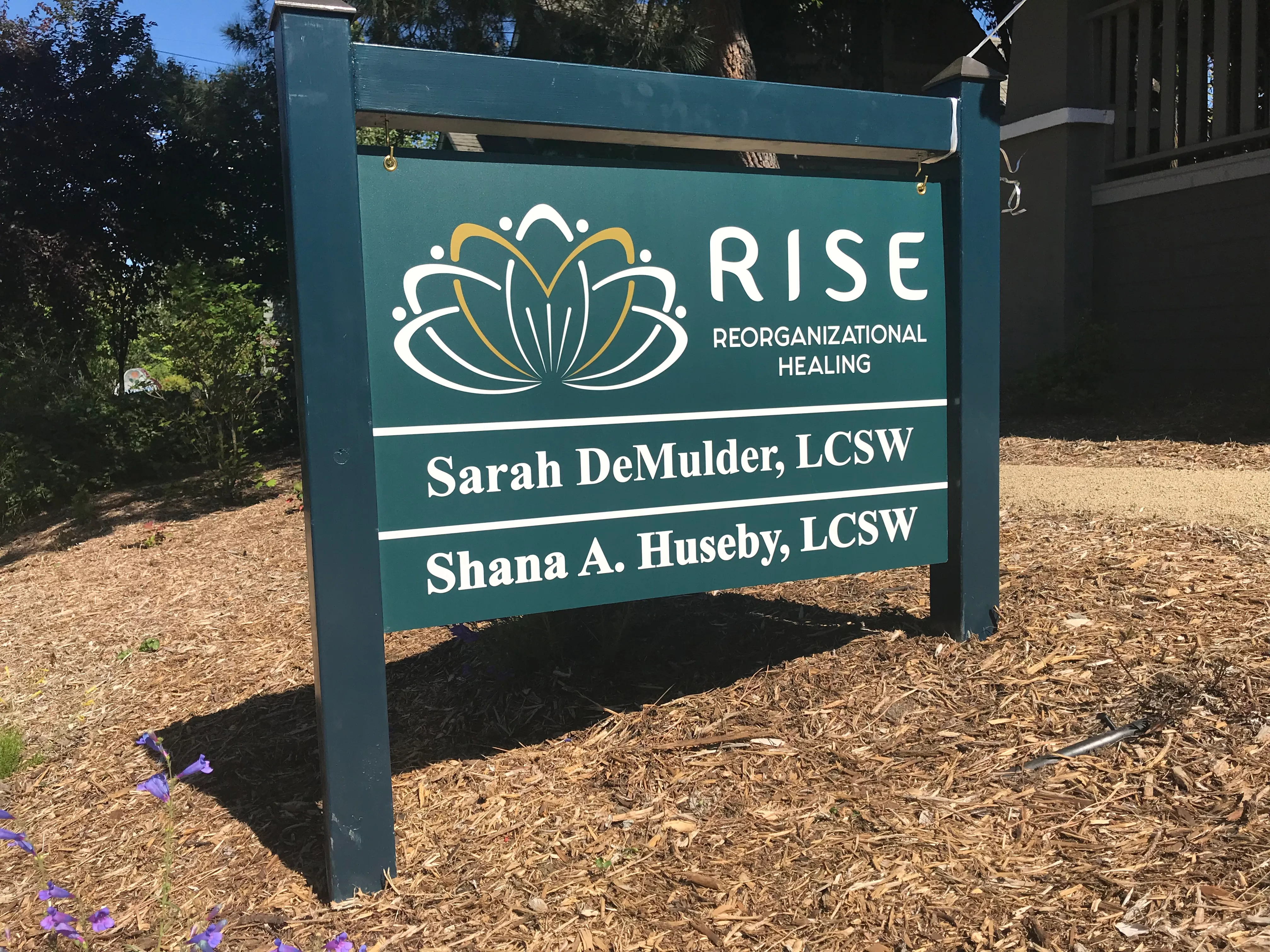 The permanent Rise Ashland sign standing outside the practice, listing the practitioners