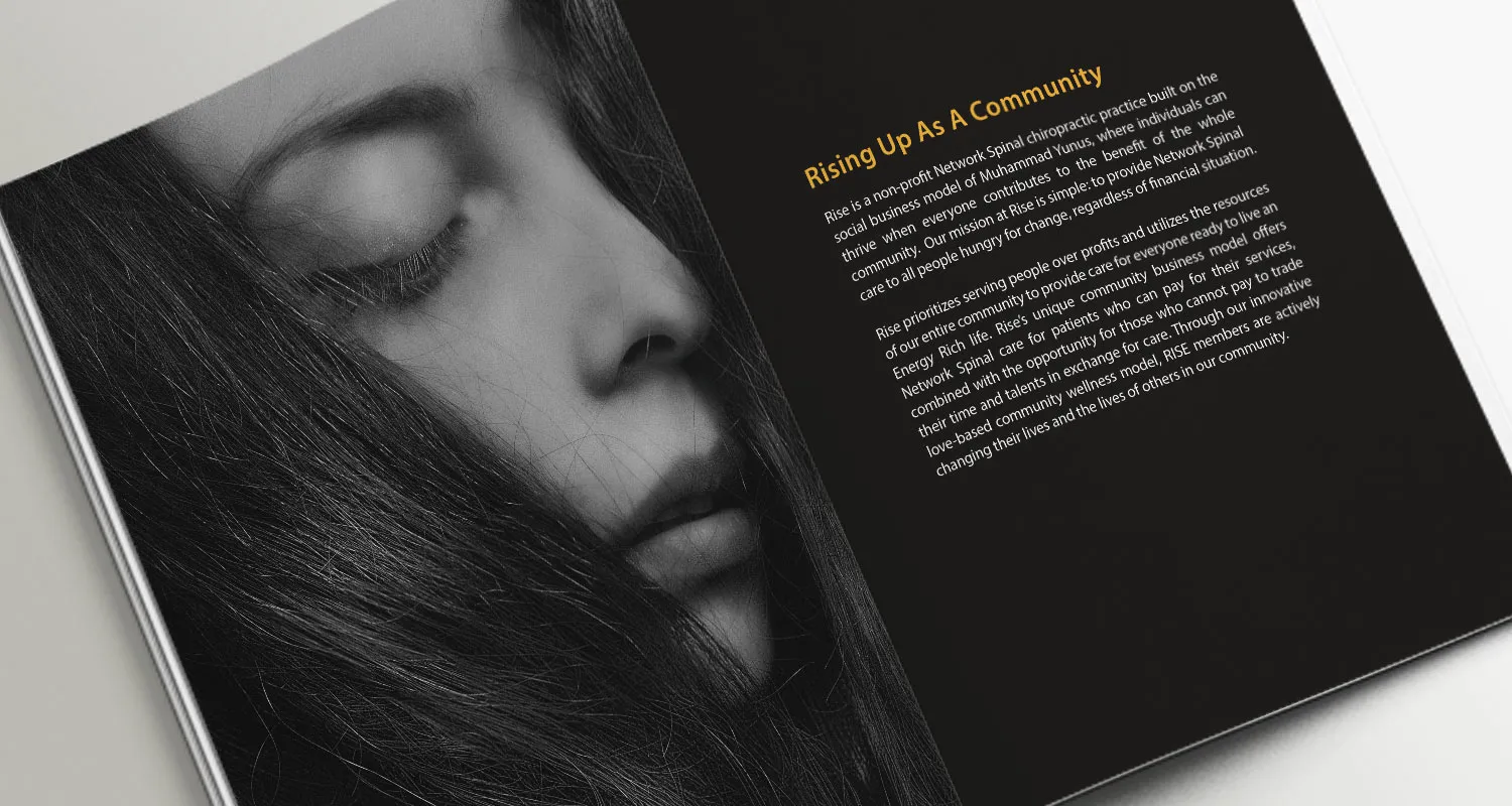 An open brochure spread: a full-bleed portrait facing a page headed Rising Up As A Community
