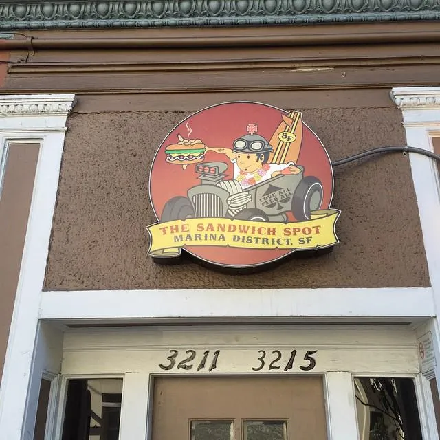 The same sign installed above the restaurant entrance on the street
