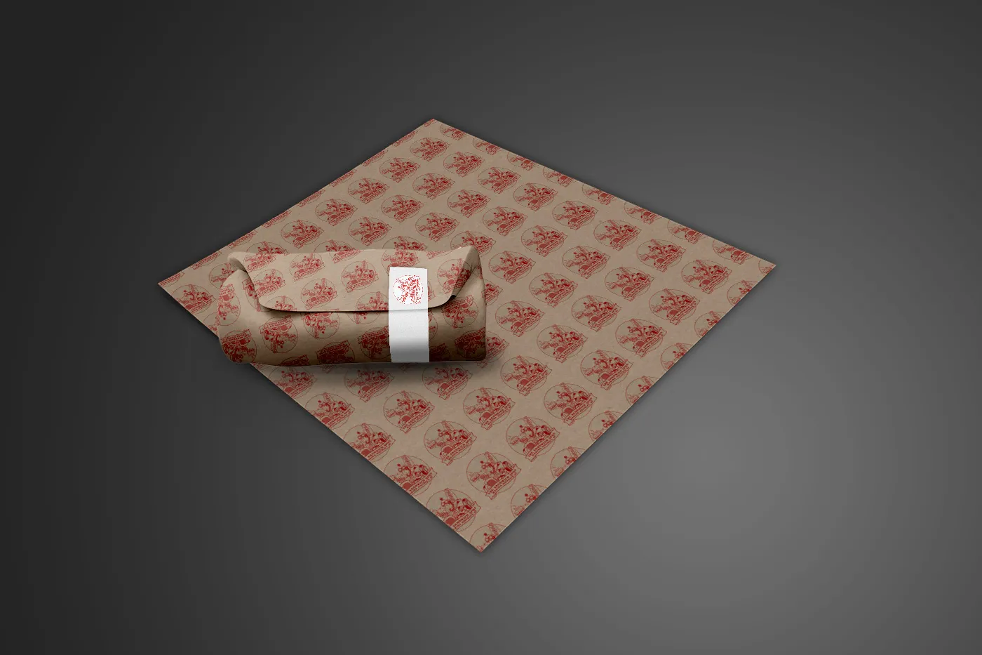 A sandwich wrapped in branded liner paper printed with the mark